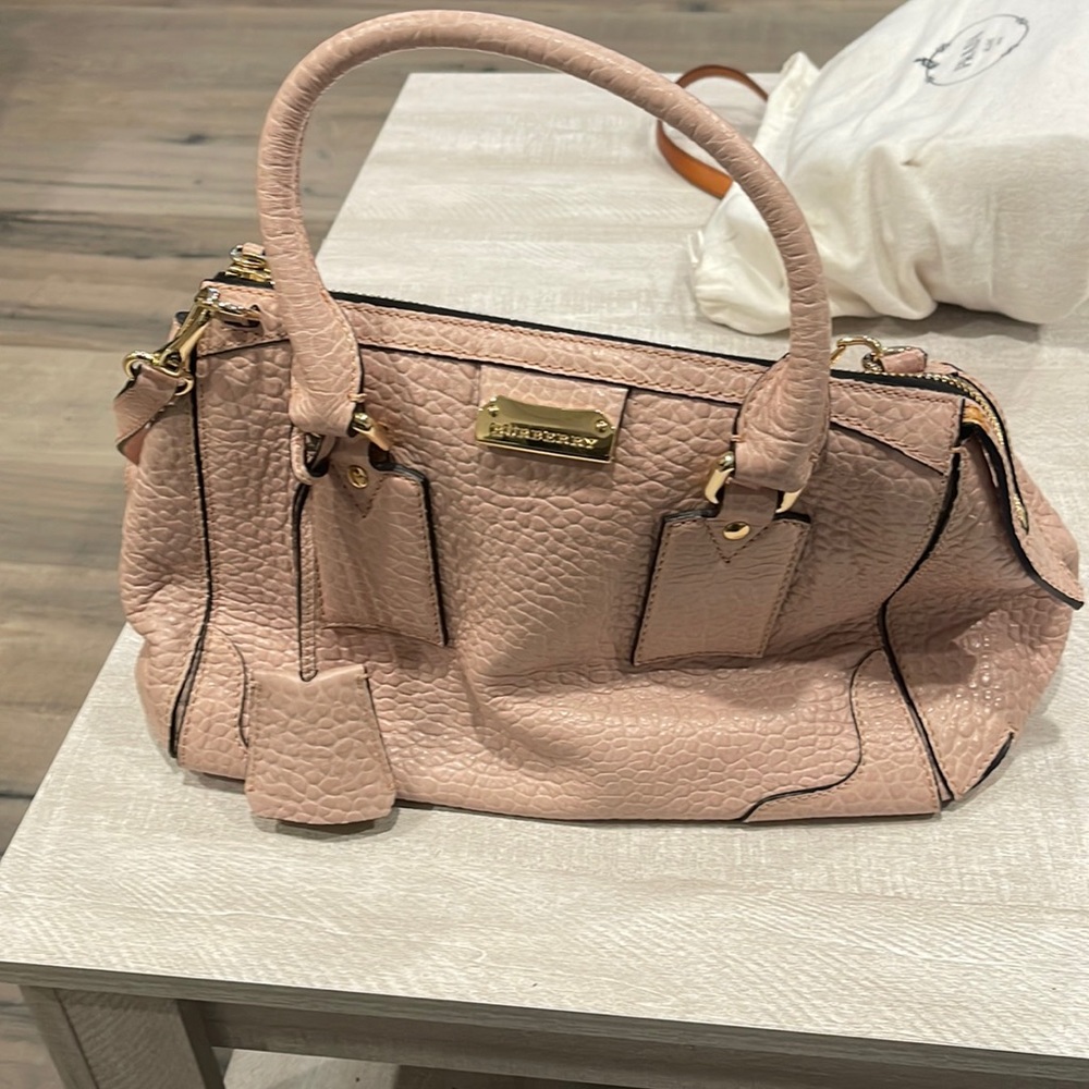 Burberry cream light pink bag.  Good condition.